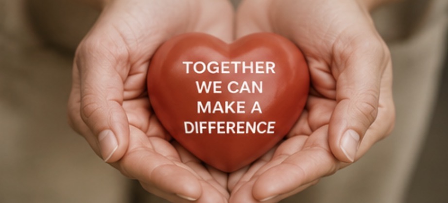 Hands gently holding a red heart with the words Together We Can Make a Difference